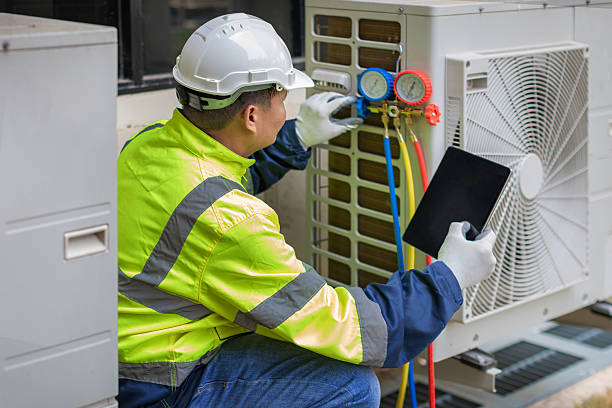 Professional Hvac technician working in Oxford, MA